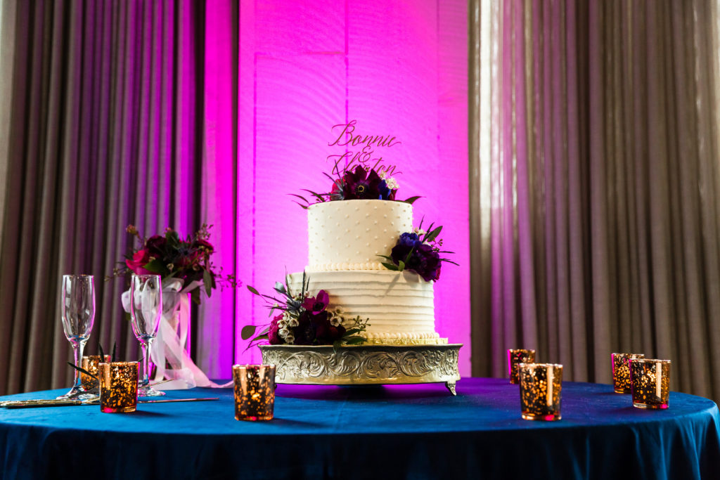 Wedding cake table with magenta backlight