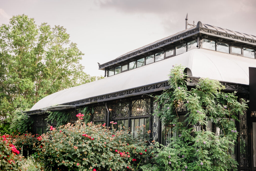 An exterior image of the wedding venue Edinburgh West, a stunning English conservatory style wedding venue in South Carolina.