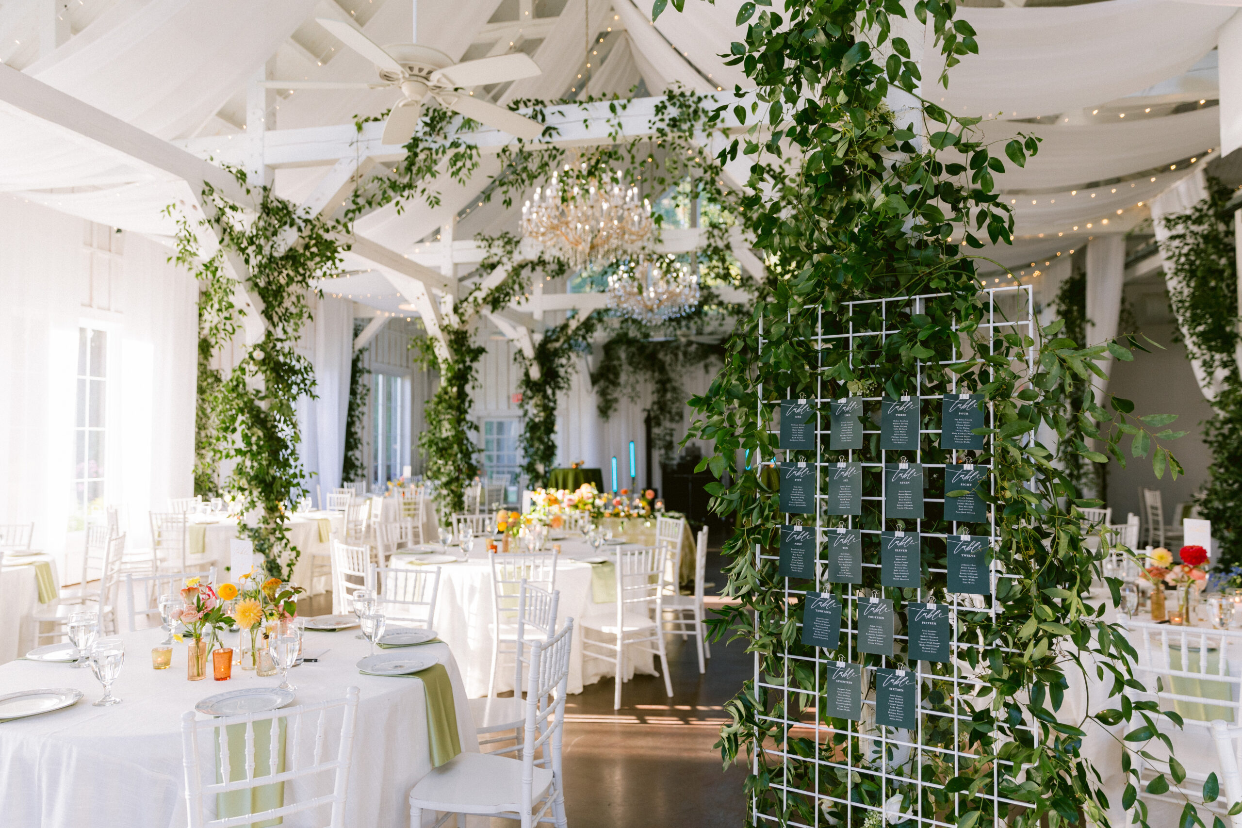 Aurora Farms wedding venue laden in vibrant florals and greenery.